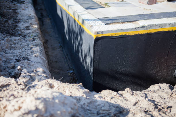 Professional Waterproofing technician working in Newnan, GA
